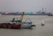 Vietnam hunts four missing after sudden thunderstorm capsized tourist boat