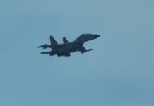 Chinese fighter ‘intercepts’ Philippine plane over disputed shoal, Manila says