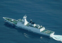 China says intercepted Philippine ships at disputed South China Sea shoal