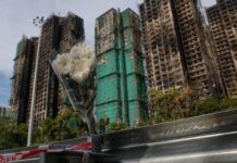 Hong Kong tower fire toll rises to 128, 200 remain missing