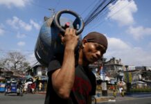 Marcos cuts excise tax on fuel products