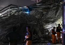 At least one dead in Philippine building collapse, 21 people missing