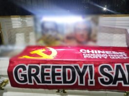Philippines says it does not condone threats of violence after anti-China caskets found in Manila