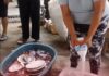 Fish Vendor Pours Bleach on Her Own Fish After Authorities Seize Her Goods