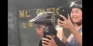 Rider & Passenger Caught in Viral Video for Allegedly Throwing Object at Child