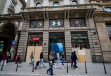 Milan luxury shops close for fear of new unrest as government prepares to deploy troops